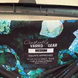 Constantly Varied Gear Black Leggings with Teal & Aqua Floral Scale Print